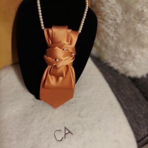 Elegant Orange Satin Tie with Pearl Accents